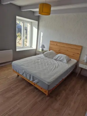 Un ou plusieurs lits dans un hébergement de l'établissement Maison 3 chambres