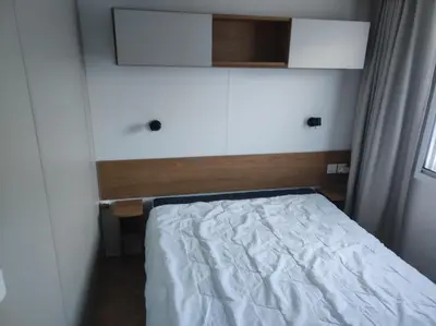 Un ou plusieurs lits dans un hébergement de l'établissement DOMA Mobil home 3 chambres Litteau