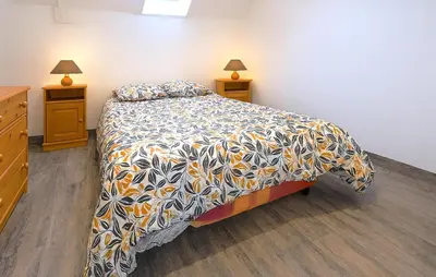 Un ou plusieurs lits dans un hébergement de l'établissement Maison Spacieuse Littoral
