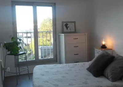 Un ou plusieurs lits dans un hébergement de l'établissement Chambre cosy à Caen centre