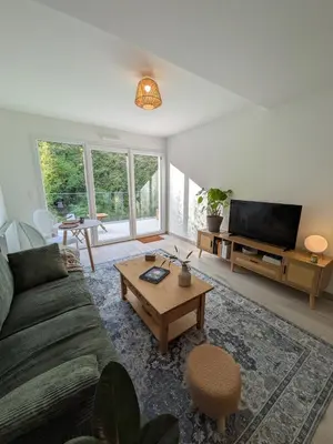 Télévision ou salle de divertissement dans l'établissement Appartement calme et lumineux au cœur de Carteret