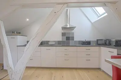 Cuisine ou kitchenette dans l'établissement Duplex centre historique de Bayeux