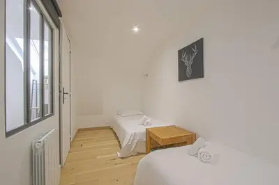 Un ou plusieurs lits dans un hébergement de l'établissement Duplex centre historique de Bayeux