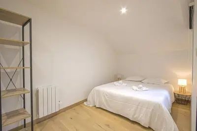 Un ou plusieurs lits dans un hébergement de l'établissement Duplex centre historique de Bayeux