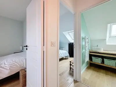 Un ou plusieurs lits dans un hébergement de l'établissement Bel appartement centre de Cancale