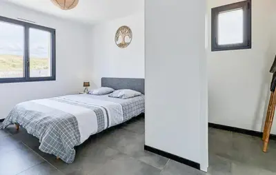 Un ou plusieurs lits dans un hébergement de l'établissement Cozy Home In Saint Germain Sur Ay With Wifi