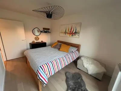 Un ou plusieurs lits dans un hébergement de l'établissement Calme et luxe dans une cité balnéaire