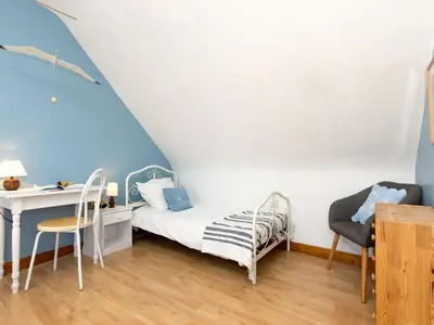 Un ou plusieurs lits dans un hébergement de l'établissement Holiday Home Le Nid de Cancale by Interhome