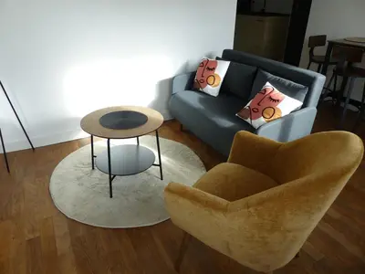 Coin salon dans l'établissement Appartement cozy
