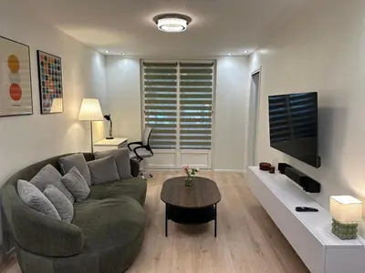 Coin salon dans l'établissement Havre de paix en ville - chez Céline