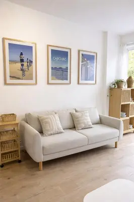 Coin salon dans l'établissement Appartement deux pièces élégant avec Vue sur Parc - Plage & Centre-Ville à Pied