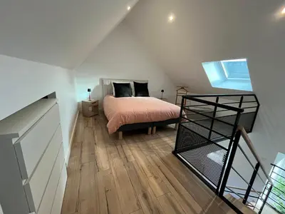 Un ou plusieurs lits dans un hébergement de l'établissement La petite maison