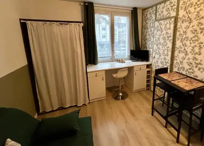 Télévision ou salle de divertissement dans l'établissement Le Nid De Bellevue