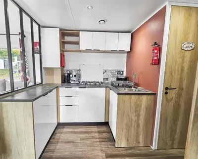 Cuisine ou kitchenette dans l'établissement L'horizon du bonheur