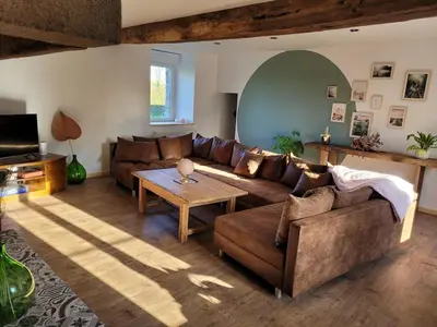 Coin salon dans l'établissement Domaine de la Venerie