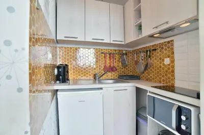 Cuisine ou kitchenette dans l'établissement Les Hauts de la Houle