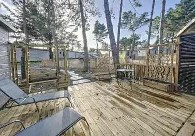 Balcon ou terrasse dans l'établissement Le Cottage de Laura Jullouville 6 pers
