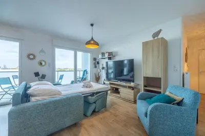 Télévision ou salle de divertissement dans l'établissement Appartement Tulipe - Welkeys