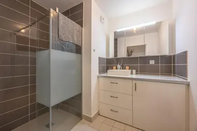 Salle de bains dans l'établissement Appartement Tulipe - Welkeys