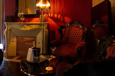Coin salon dans l'établissement Les Secrets du Mont - Love Room