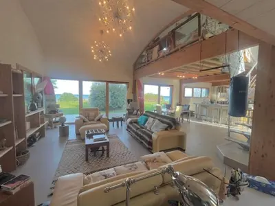 Télévision ou salle de divertissement dans l'établissement Villa rhum omaha beach