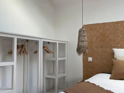 Un ou plusieurs lits dans un hébergement de l'établissement La Maison Rose - Ciel by Melrose