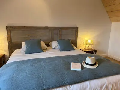 Un ou plusieurs lits dans un hébergement de l'établissement Cottage avec Piscine et Jacuzzi - Normandie