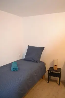 Un ou plusieurs lits dans un hébergement de l'établissement La Blanche des Marais, maison de ville