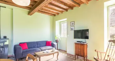 Télévision ou salle de divertissement dans l'établissement Gîte Les Fresnes