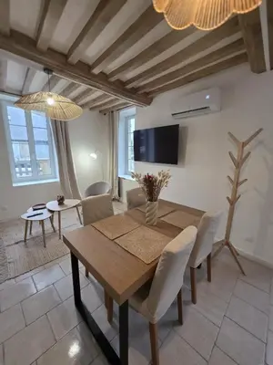 Télévision ou salle de divertissement dans l'établissement Maison Marceau