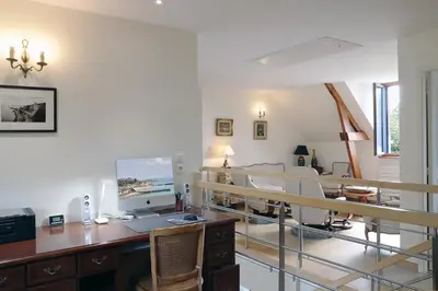 Coin salon dans l'établissement Les Chouettes