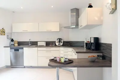 Cuisine ou kitchenette dans l'établissement Les Chouettes