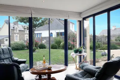 Coin salon dans l'établissement Les Chouettes
