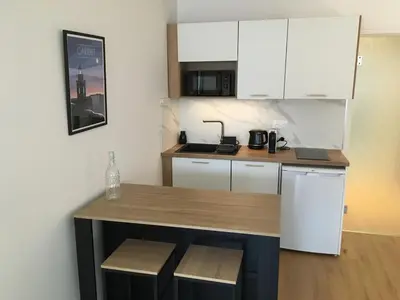 Cuisine ou kitchenette dans l'établissement Carteret centre, port avec balcon vue mer