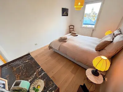 Un ou plusieurs lits dans un hébergement de l'établissement Résidence calme avec balcon privé & vue sur Caen
