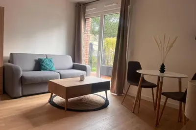 Coin salon dans l'établissement Bright studio in Cabourg close to the beach!