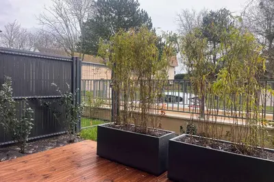 Jardin de l'établissement Bright studio in Cabourg close to the beach!