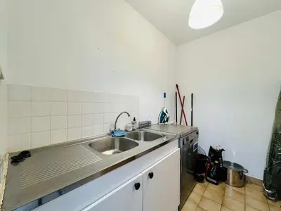 Cuisine ou kitchenette dans l'établissement Le Repos de Sainte mere - House near the center