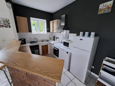 Cuisine ou kitchenette dans l'établissement Maison au Calme en Normandie