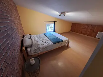 Un ou plusieurs lits dans un hébergement de l'établissement Maison au Calme en Normandie