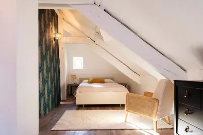 Un ou plusieurs lits dans un hébergement de l'établissement Appartement au coeur du Vaugueux