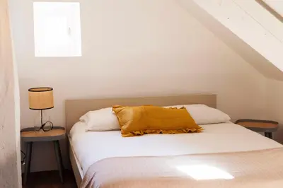 Un ou plusieurs lits dans un hébergement de l'établissement Appartement au coeur du Vaugueux