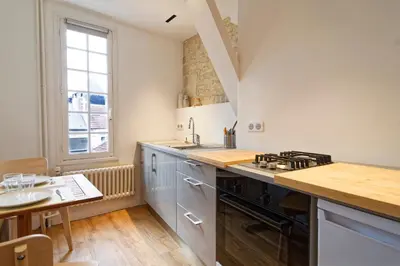Cuisine ou kitchenette dans l'établissement Le Cosy de la Rue Froide - Centre Historique