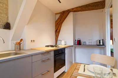 Cuisine ou kitchenette dans l'établissement Le Cosy de la Rue Froide - Centre Historique