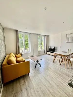 Coin salon dans l'établissement Appartement lumineux avec vue sur les clochers