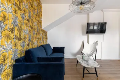 Coin salon dans l'établissement Appartement moderne au coeur du quartier historique