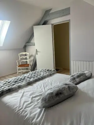 Un ou plusieurs lits dans un hébergement de l'établissement Jolie maison pour escapade coccooning à la campagne
