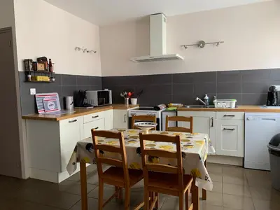 Cuisine ou kitchenette dans l'établissement La Capitainerie 4 chambres