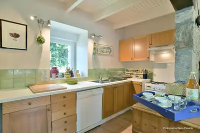 Cuisine ou kitchenette dans l'établissement Fleur de Marie