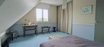 Un ou plusieurs lits dans un hébergement de l'établissement La Villa du Manoir